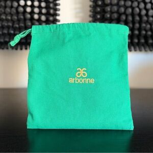 Arbonne Emerald Green Pouch with Yellow Gold Logo